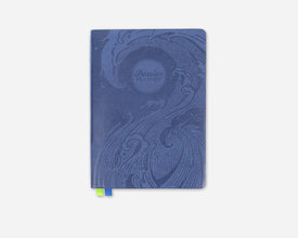 Blue planner with a decorative wave on the cover on a white background