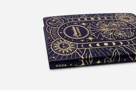 Planner with celestial design and '2026' on the spine