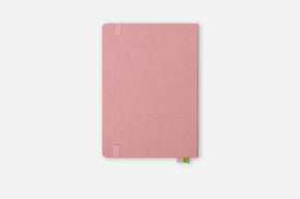 Pink notebook on a white background