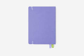 Purple planner with a green bookmark on a white background