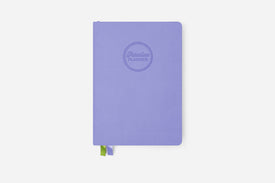 Purple planner with a Passion Planner logo on a white background