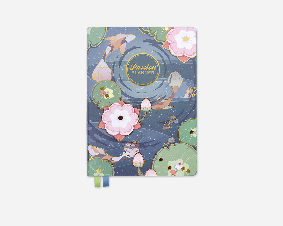 Koi fish pond design on a notebook with &