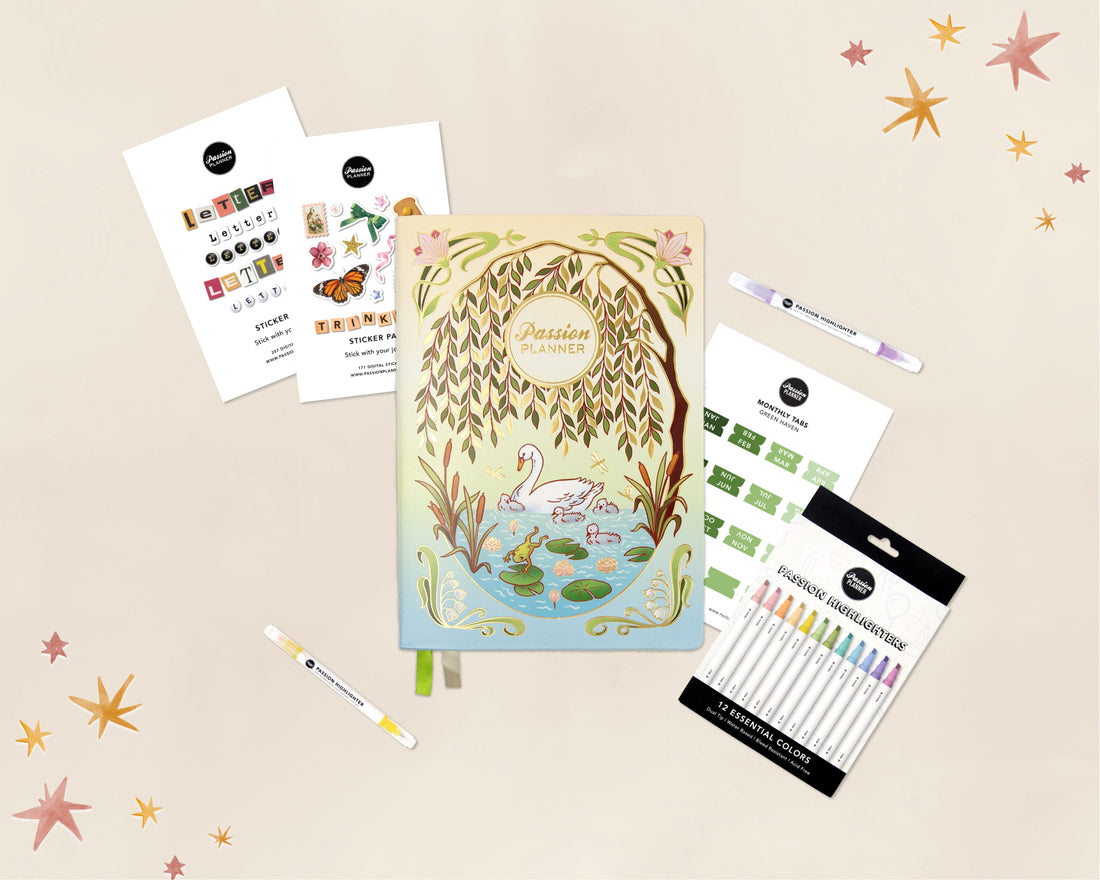 A stationery gift set arranged on a warm beige background with scattered star stickers. The set includes a pastel illustrated planner titled &
