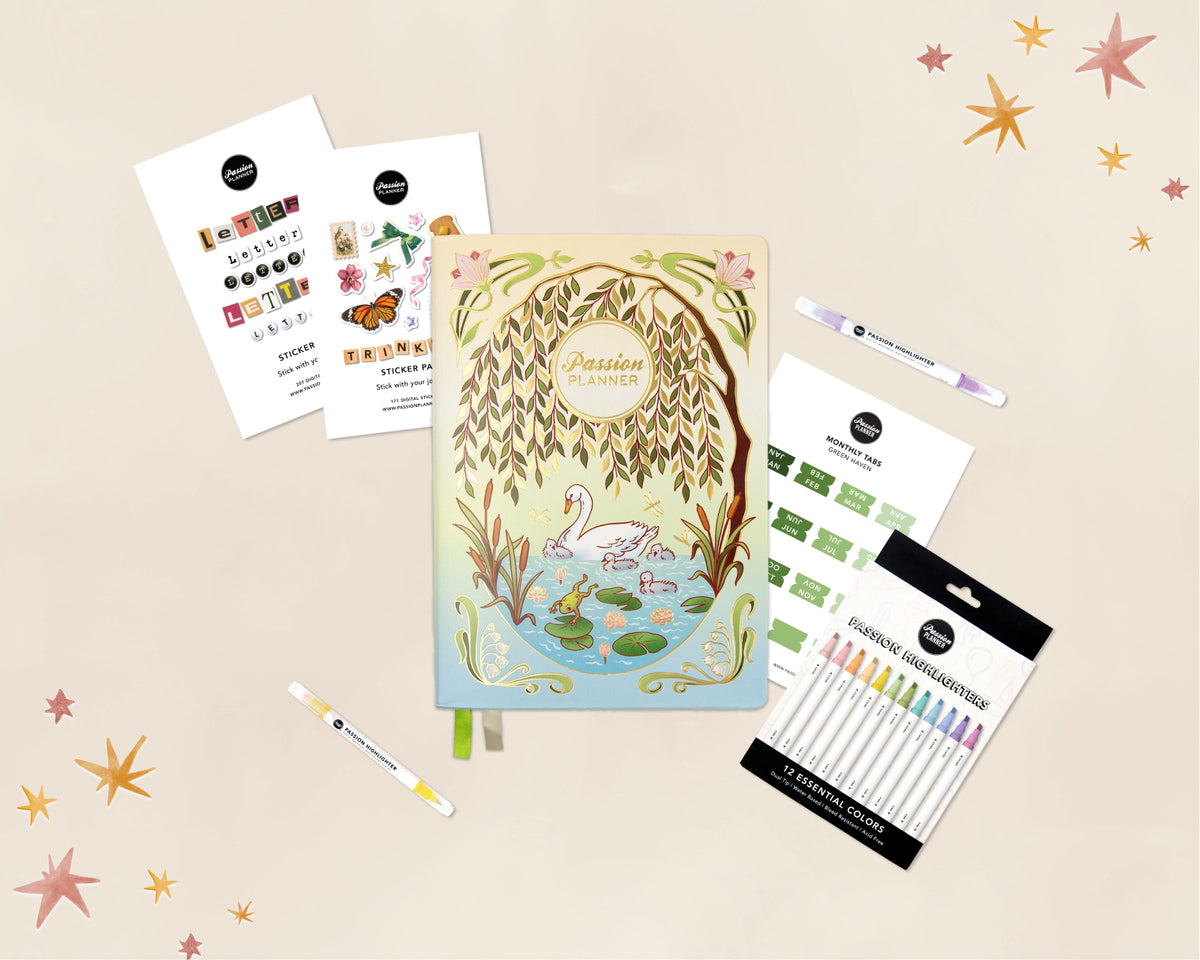 A stationery gift set arranged on a warm beige background with scattered star stickers. The set includes a pastel illustrated planner titled 'Passion Planner,' sticker sheets, monthly tabs, and a pack of multicolor highlighter pens.