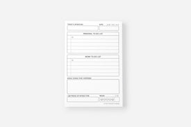 Notebook with a to-do list and reflection section on a white background