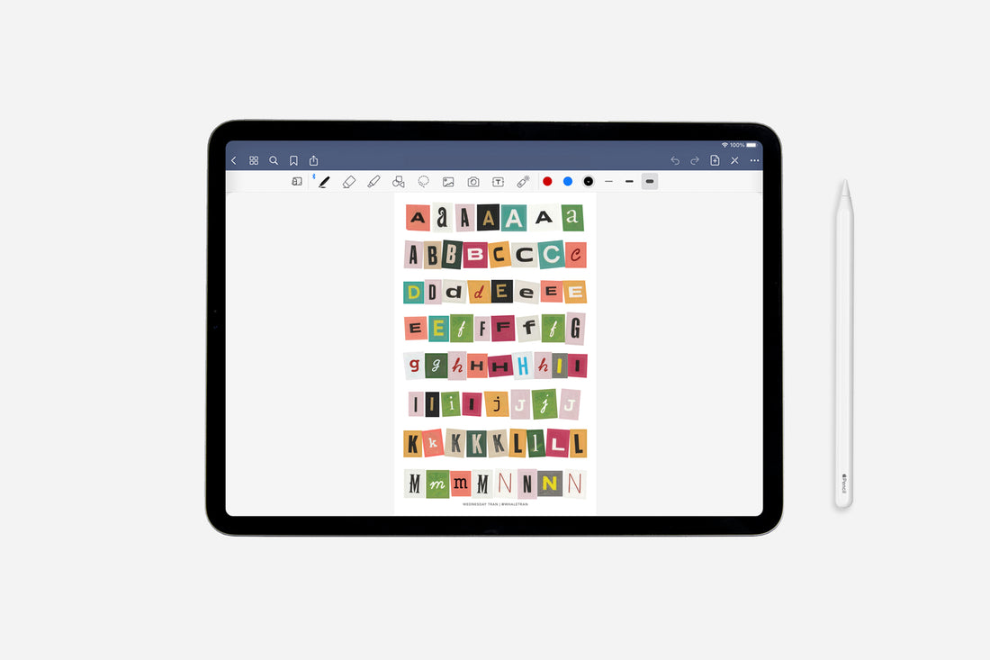 Tablet displaying a colorful alphabet sticker sheet with a stylus on a white background