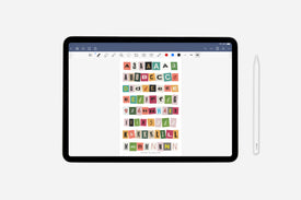 Tablet displaying a colorful alphabet sticker sheet with a stylus on a white background
