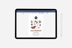 iPad displaying a trinkets sticker pack on a white background with a stylus next to it