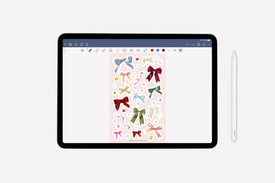 Tablet displaying a digital sticker sheet of colorful bows on a white background, with a stylus on the side.