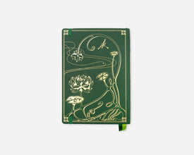 A dark green hardcover notebook featuring elegant gold Art Nouveau-style illustrations of lotus flowers, leaves, and a dragonfly, with a small green ribbon bookmark hanging from the bottom right.