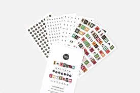 Five sticker sheets with different letter designs on a white background