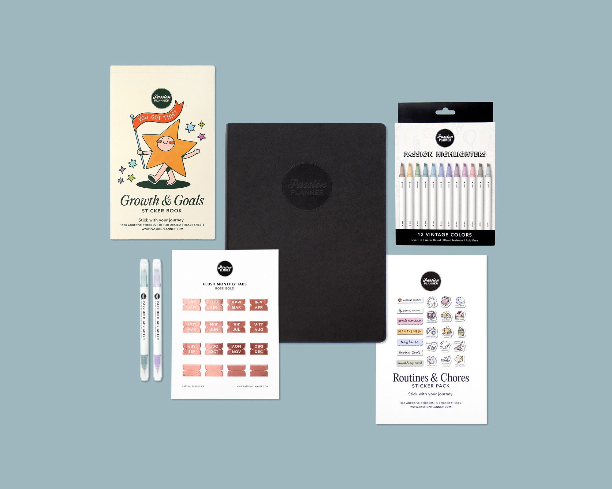 Collection of stationery items including a sticker book, a weekly planner, and highlighters on a blue background.