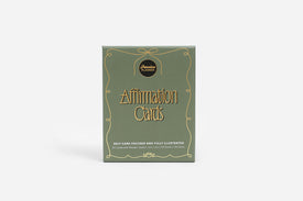 Box of affirmation cards with decorative design on a white background